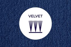 Cross section of cut yarns in a velvet carpet on a neutral carpet background